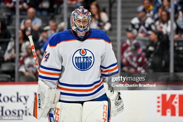 Stuart Skinner of the Edmonton Oilers looks on in the second period of a game against the Colorado Avalanche at Ball Arena on April 11, 2023 in...