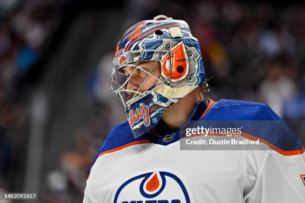 Stuart Skinner of the Edmonton Oilers looks on in the second period of a game against the Colorado Avalanche at Ball Arena on April 11, 2023 in...