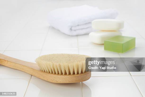 body brush and bath goods - back brush stock pictures, royalty-free photos & images