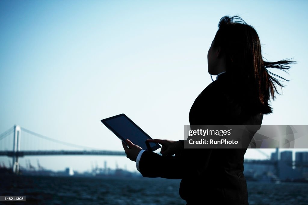 Businesswoman with tablet computer