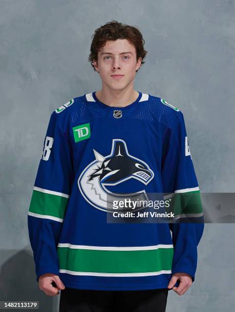 Cole McWard of the Vancouver Canucks poses for his official headshot for the 2022-2023 season before their NHL game against the Chicago Blackhawks at...