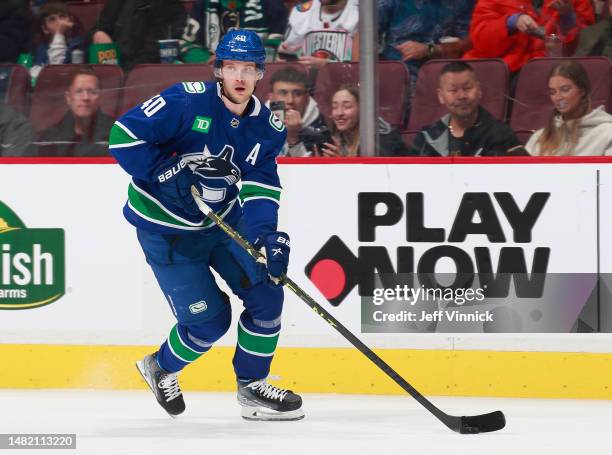 Elias Pettersson of the Vancouver Canucks skates up ice during their NHL game against the Chicago Blackhawks at Rogers Arena April 6, 2023 in...