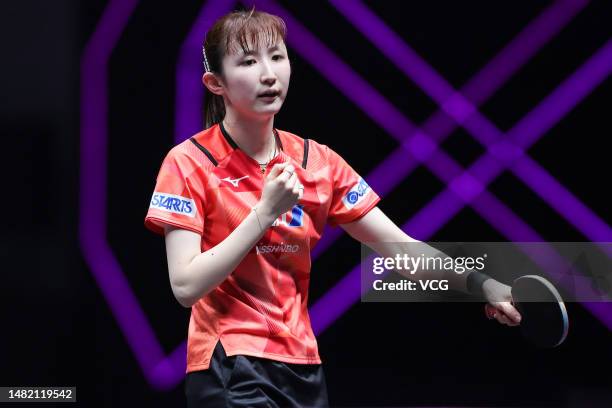 Hina Hayata of Japan reacts against Chen Meng of China in their Women's Singles quarter-final match on day five of WTT Champions Xinxiang 2023 at...