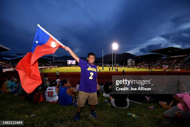 Fan poses for a photo during the round eight Super Rugby Pacific match between Moana Pasifika and Queensland Reds at Apia Park National Stadium, on...