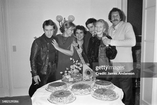 Marina Vlady celebrates her birthday with her husband and some friends. From left to right : Vladimir Vysotsky, Marina Vlady, Claude Nougaro,...