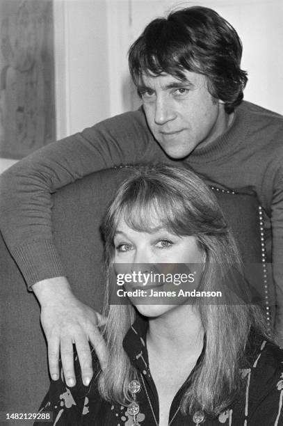 French actress Marina Vlady is serenaded by her husband Vladimir Vysotsky, a Russian anti-establishment actor, poet, songwriter and singer in the...