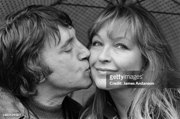 French actress Marina Vlady is serenaded by her husband Vladimir Vysotsky, a Russian anti-establishment actor, poet, songwriter and singer in the...