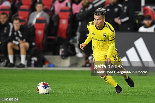 Lucas Zelarayan of Columbus Crew moves the ball during a game between Columbus Crew and D.C. United at Audi Field on April 8, 2023 in Washington, DC.