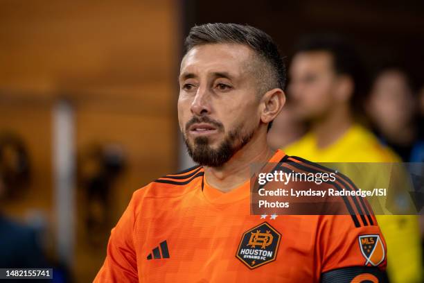 Hector Herrera of the Houston Dynamo leads out the players before a game between Houston Dynamo FC and San Jose Earthquakes at PayPal Park on April...