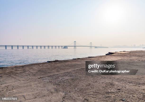 dalian xinghai bay  -  seaside parking lot - liaoning province stock pictures, royalty-free photos & images