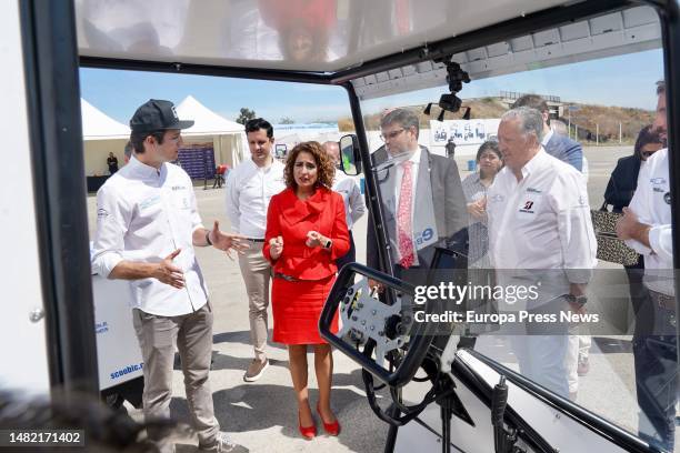 The Minister of Finance and Public Function, Maria Jesus Montero next to an electric vehicle during a visit to the Scoobic plant. On April 14 in...