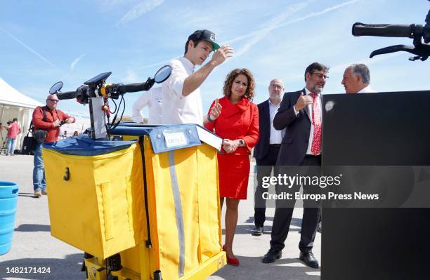 The Minister of Finance and Public Function, Maria Jesus Montero next to an electric vehicle during a visit to the Scoobic plant. On April 14 in...