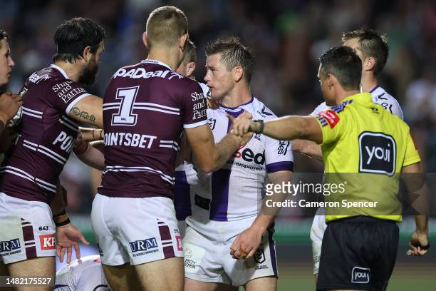 Harry Grant of the Storm scuffles with Sea Eagles players during the round seven NRL match between the Manly Sea Eagles and Melbourne Storm at 4...