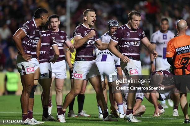 Tom Trbojevic of the Sea Eagles celebrates winning the round seven NRL match between the Manly Sea Eagles and Melbourne Storm at 4 Pines Park on...