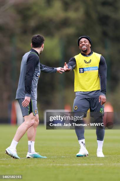 Pedro Neto and Adama Traore of Wolverhampton Wanderers following a Wolverhampton Wanderers Training Session at The Sir Jack Hayward Training Ground...