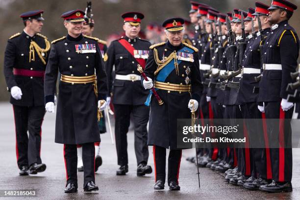 King Charles III inspects the 200th Sovereign's parade at Royal Military Academy Sandhurst on April 14, 2023 in Camberley, England. The parade marks...