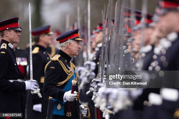 King Charles III inspects the 200th Sovereign's parade at Royal Military Academy Sandhurst on April 14, 2023 in Camberley, England. The parade marks...