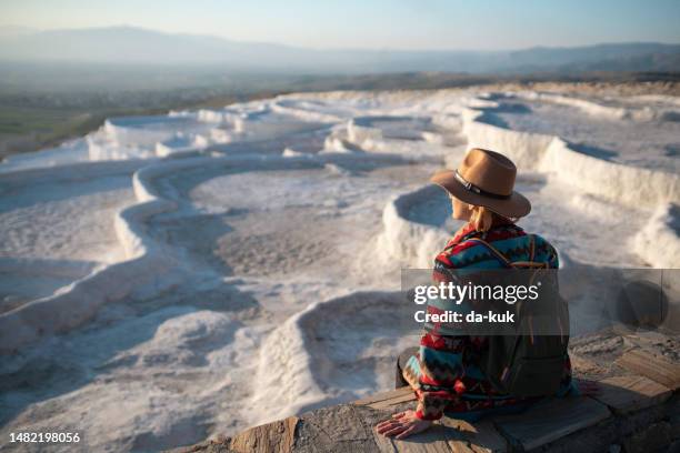 pamukkale's tranquil travertine pools: a tourist's perfect escape - pamukkale stock pictures, royalty-free photos & images