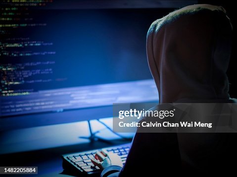 Rear View Of User Typing In Front Of Computer Screen High-Res Stock ...