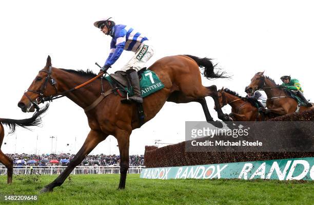 Pic D'Orhy ridden by Harry Cobden jumps en route to winning the Marsh Chase on Ladies Day during the second day of the Grand National Festival at...