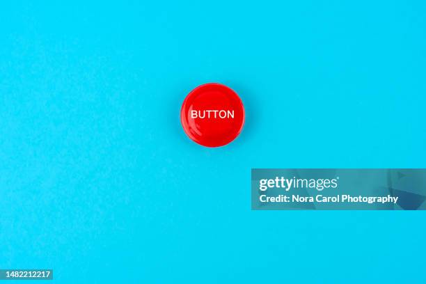 panic button on blue background - symbol stock pictures, royalty-free photos & images