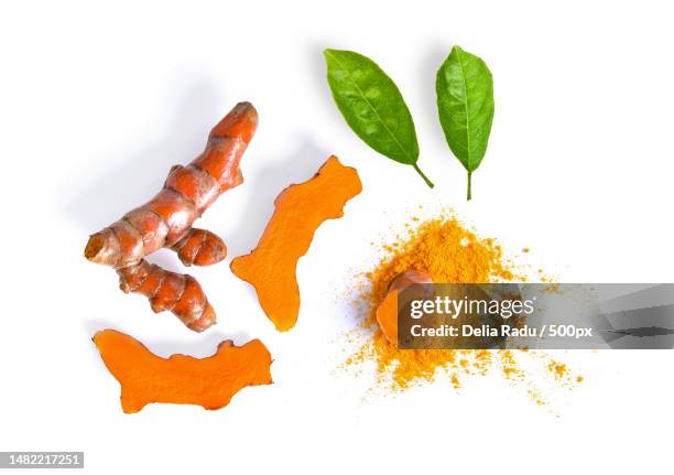 turmeric with leaf isolated on white background,romania - tumeric stock pictures, royalty-free photos & images