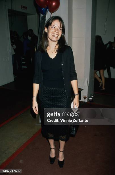 Holly Marie Combs attends an event, Untied States, 1998.
