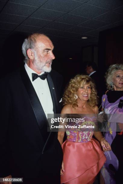 Sean Connery and Micheline Roquebrune attend a red carpet event, United States, circa 1990s.