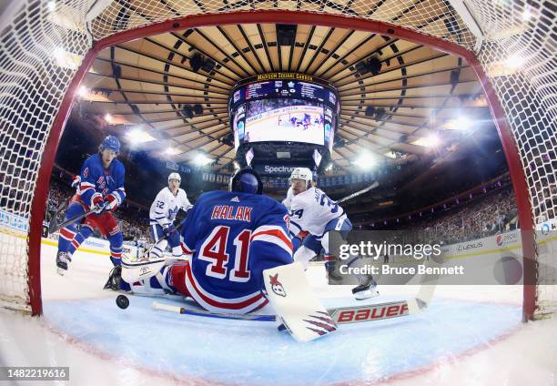 Auston Matthews of the Toronto Maple Leafs is stopped by Jaroslav Halak of the New York Rangers at Madison Square Garden on April 13, 2023 in New...