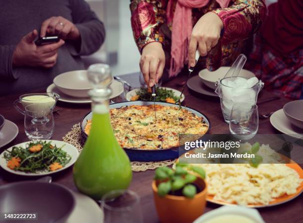 family and friends gathering on dinner - algerian people photos et images de collection