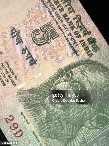mahatma gandhi portrait on india paper currency - royalty free vintage images stock-fotos und bilder