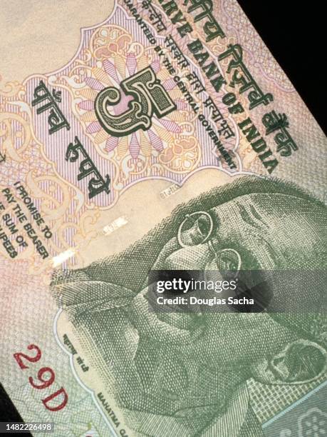 mahatma gandhi portrait on india paper currency - gandhi stock-fotos und bilder