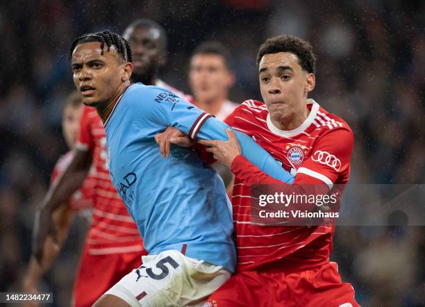 Manuel Akanji of Manchester City and Jamal Musiala of Bayern Munich in action during the UEFA Champions League quarter final first leg match between...