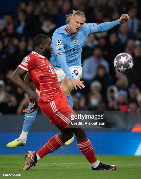 Erling Haaland of Manchester City and Dayot Upamecano of Bayern Munich in action during the UEFA Champions League quarter final first leg match...