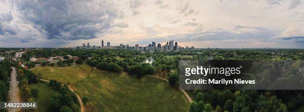 panoramic drone view point of storm cloud over atlanta - "marilyn nieves" stock pictures, royalty-free photos & images