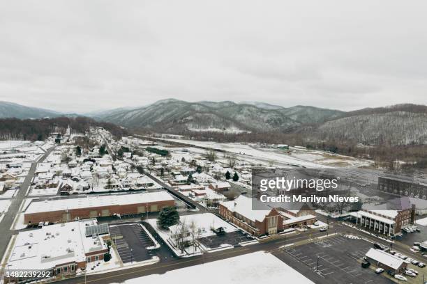 aerial of small town erwin tennessee on a snowy day - "marilyn nieves" stock pictures, royalty-free photos & images