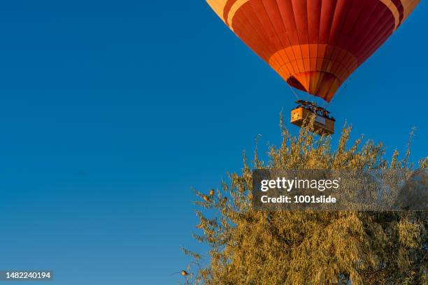 hot air balloons in cappadocia - cave fire stock pictures, royalty-free photos & images