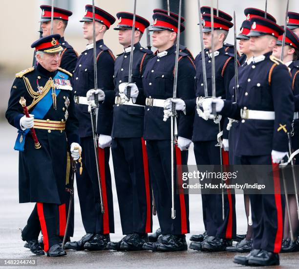 King Charles III inspects the 200th Sovereign's parade at the Royal Military Academy Sandhurst on April 14, 2023 in Camberley, England. The...