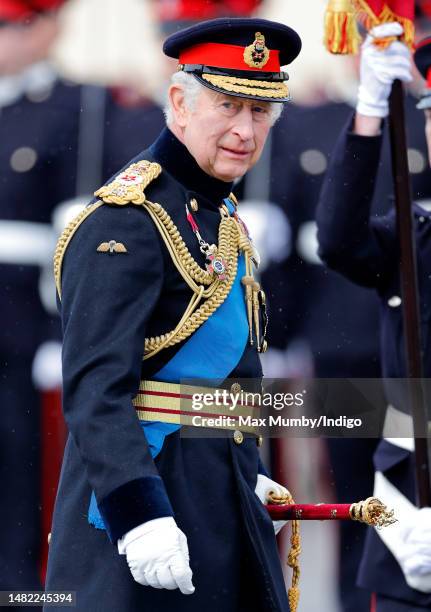 King Charles III inspects the 200th Sovereign's parade at the Royal Military Academy Sandhurst on April 14, 2023 in Camberley, England. The...