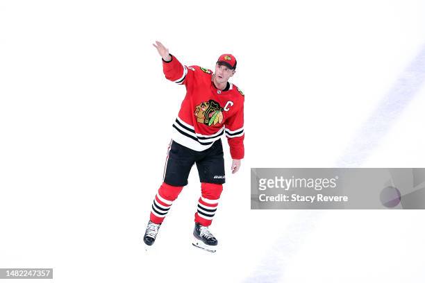 Jonathan Toews of the Chicago Blackhawks waves to the crowd following a game against the Philadelphia Flyers at United Center on April 13, 2023 in...