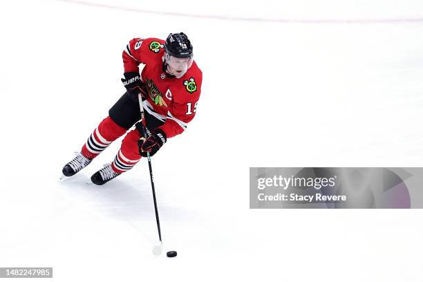 Jonathan Toews of the Chicago Blackhawks controls the puck during a game against the Philadelphia Flyers at the United Center on April 13, 2023 in...