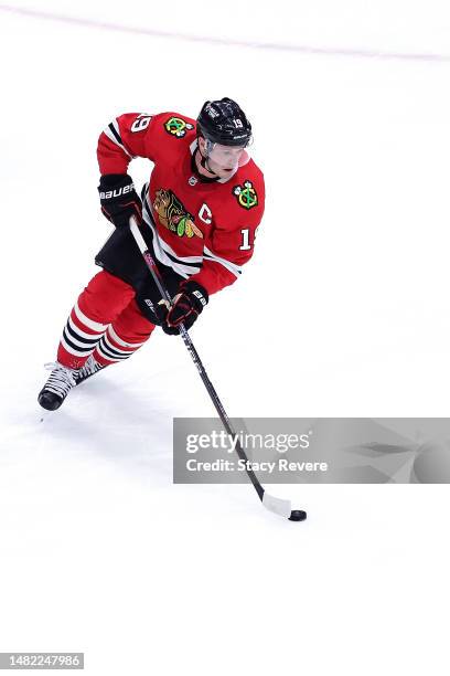 Jonathan Toews of the Chicago Blackhawks controls the puck during a game against the Philadelphia Flyers at the United Center on April 13, 2023 in...