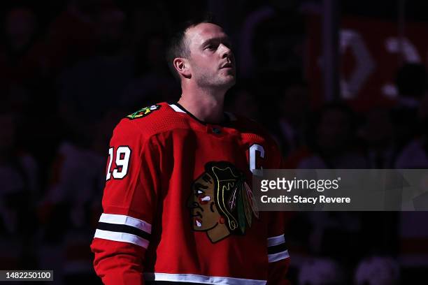 Jonathan Toews of the Chicago Blackhawks stands for the National Anthem prior to a game against the Philadelphia Flyers at United Center on April 13,...