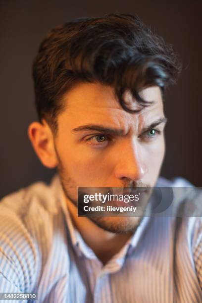 brunette man in studio on black background. - indian male model stockfoto's en -beelden