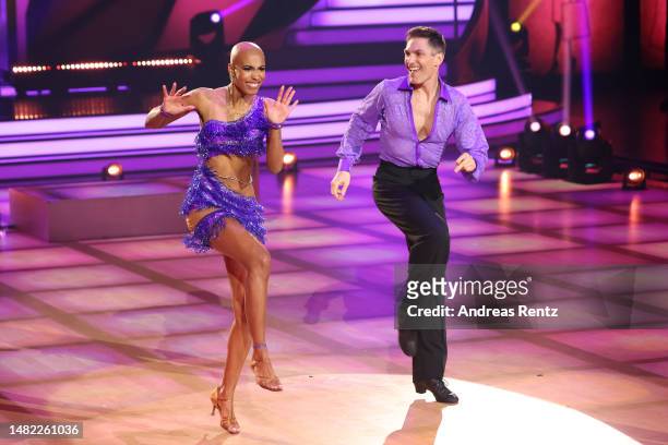 Sharon Battiste and Christian Polanc dance on stage during the 7th Show of "Let's Dance" at MMC Studios on April 14, 2023 in Cologne, Germany.