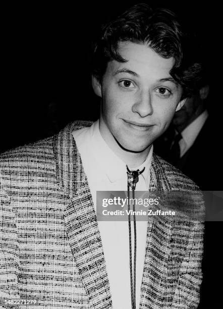 Jon Cryer at the Jacob Javits Convention Centre for AmFER by Elizabeth Taylor's foundation in New York City, New York, United States, circa 1980s.