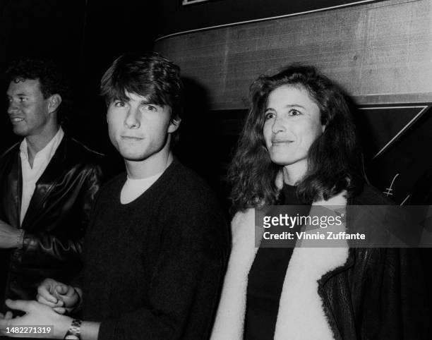 Tom Cruise and wife Mimi Rogers attend the La Coliseum to see Bruce Springsteen, Los Angeles, California, United States, circa 1980s.