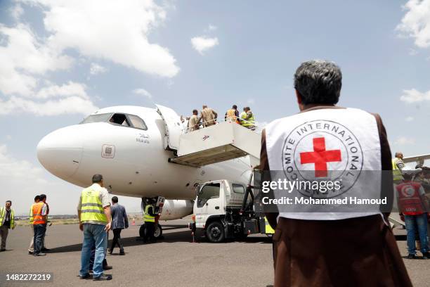 Plane chartered by the International Committee of the Red Cross land the Sana'a International Airport carrying detainees freed through a prisoner...