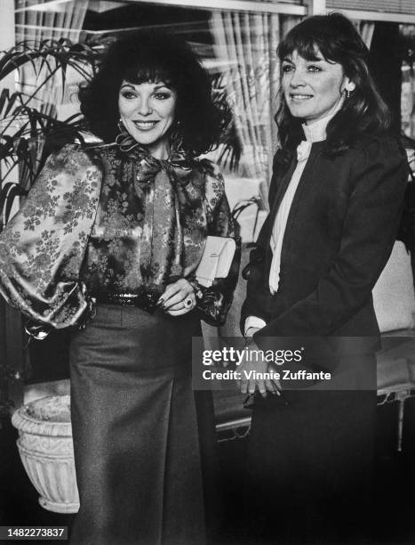 Joan Collins and Pamela Sue Martin attend an event, United States, circa 1980s.