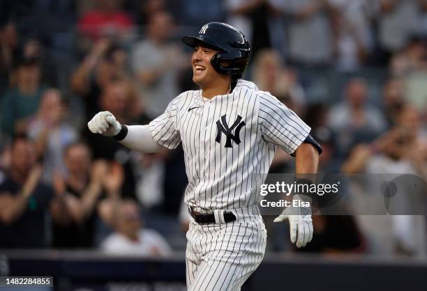 Anthony Volpe of the New York Yankees celebrates his first Major League home run in the first inning against the Minnesota Twins at Yankee Stadium on...